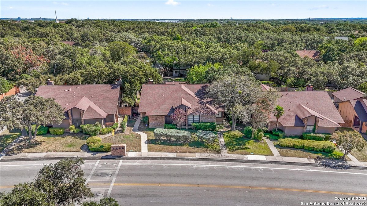 9308 Dover Ridge San Antonio, TX 78250 - Photo 29 of 41 an aerial view of residential houses with outdoor space and street view