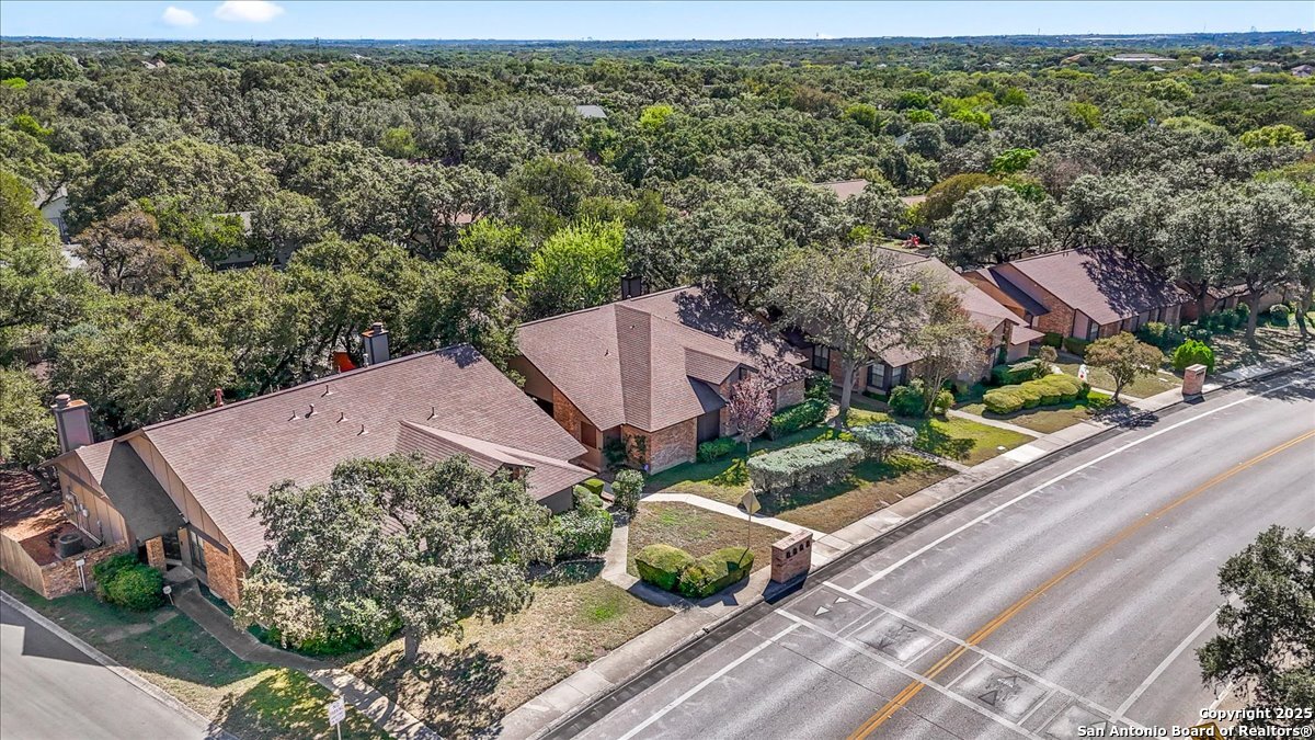 9308 Dover Ridge San Antonio, TX 78250 - Photo 31 of 41 an aerial view of a house with garden space and street view