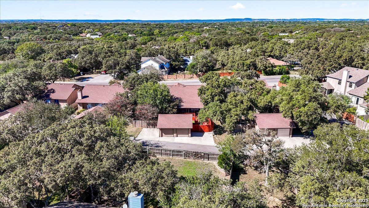 9308 Dover Ridge San Antonio, TX 78250 - Photo 36 of 41 an aerial view of a house with a garden