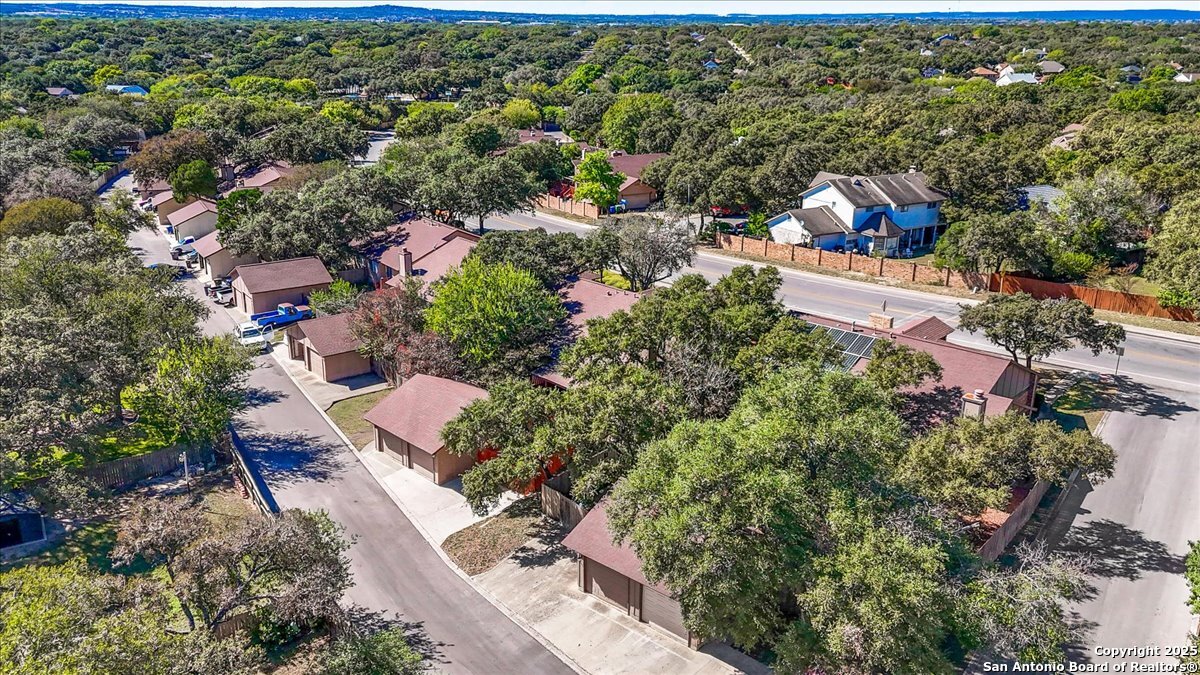 9308 Dover Ridge San Antonio, TX 78250 - Photo 40 of 41 an aerial view of a city with lots of residential buildings
