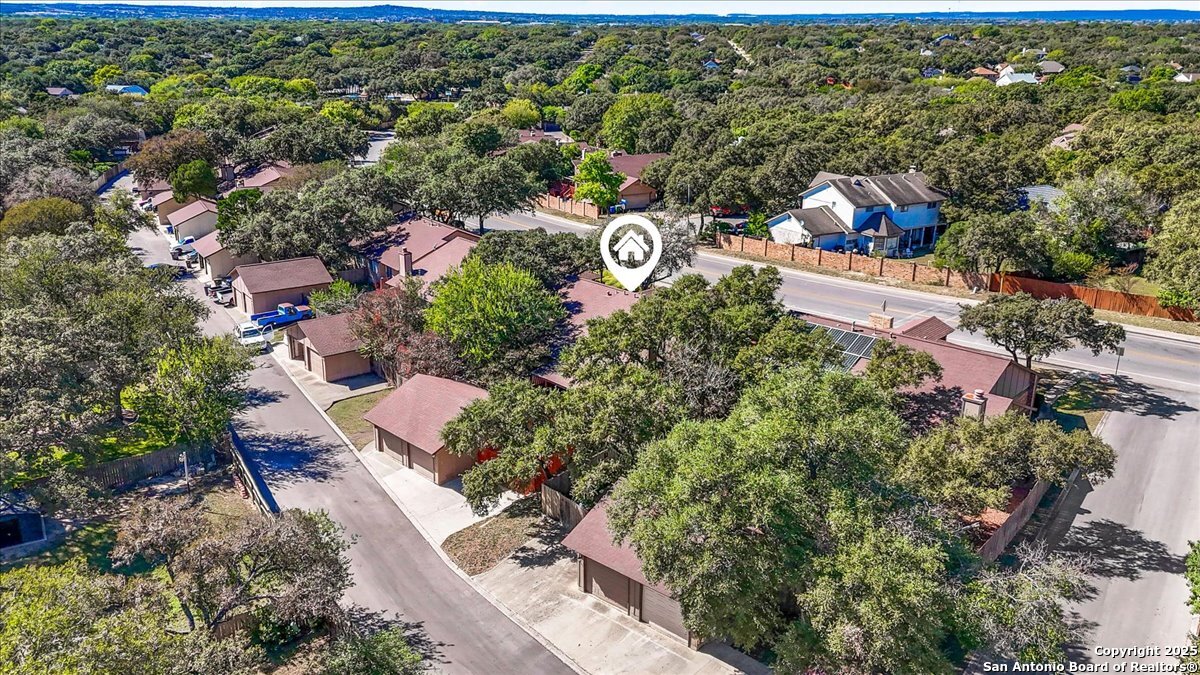 9308 Dover Ridge San Antonio, TX 78250 - Photo 41 of 41 an aerial view of a city with lots of residential buildings