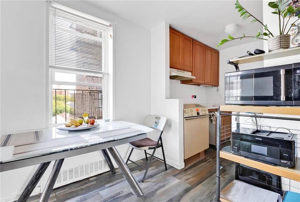 2155 82nd Street, Unit 5D Brooklyn, NY 11214 - Photo 14 of 19 a workspace with furniture and window