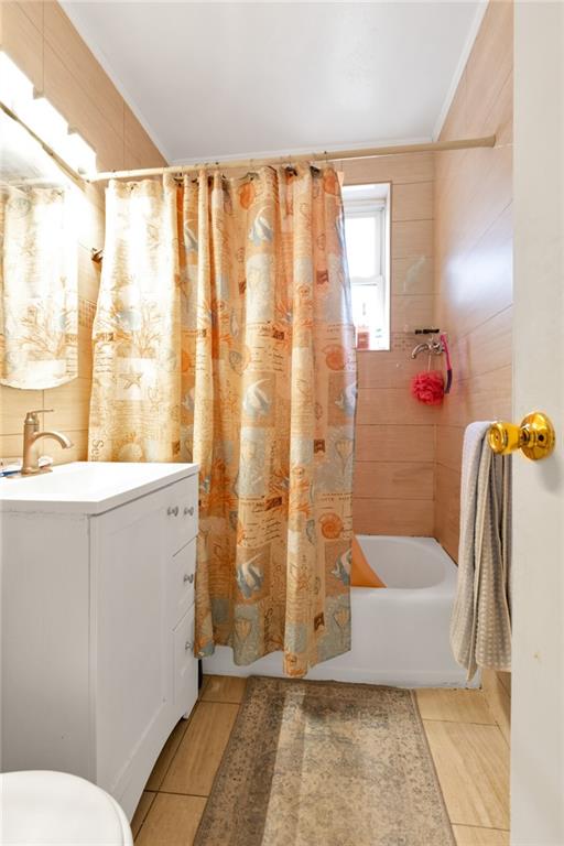 2155 82nd Street, Unit 5D Brooklyn, NY 11214 - Photo 17 of 19 a bathroom with a bathtub and shower