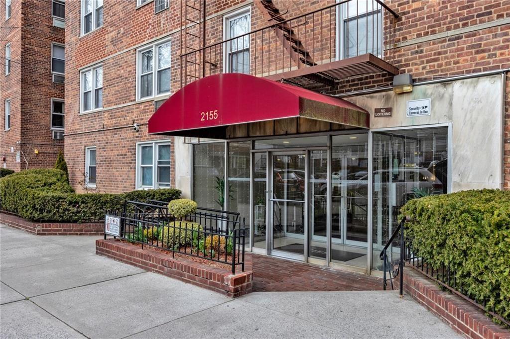 2155 82nd Street, Unit 5D Brooklyn, NY 11214 - Photo 18 of 19 a view of a house with a garden