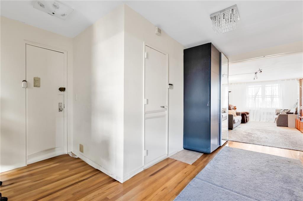 2155 82nd Street, Unit 5D Brooklyn, NY 11214 - Photo 6 of 19 a view of a bedroom bathroom and front door
