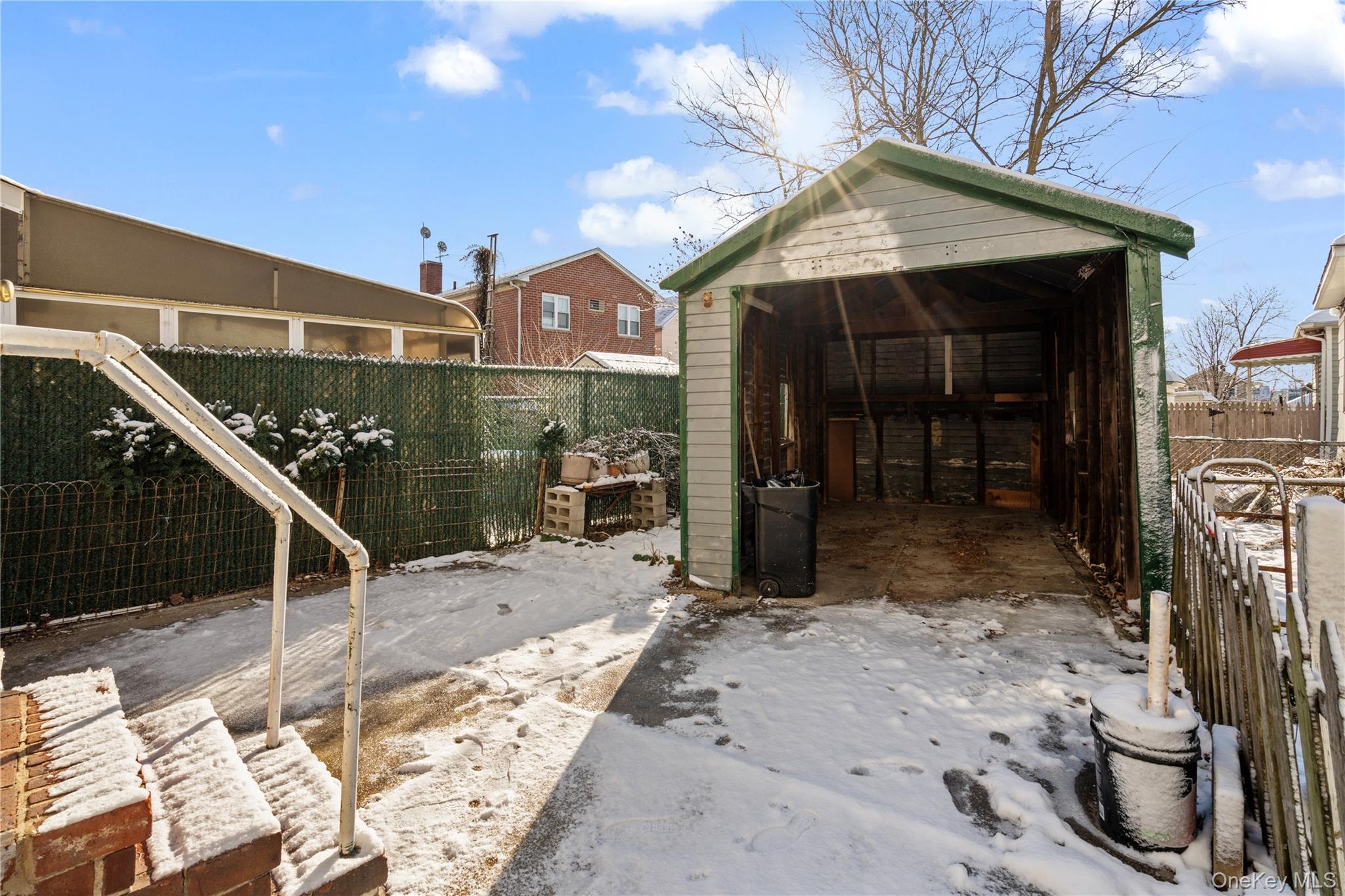 123-10 25th Road Queens, NY 11354 - Photo 26 of 27 View of patio with an outdoor structure