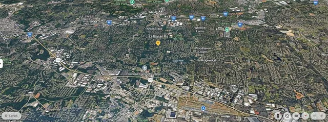 wooden bathroom with a bathtub and a shower