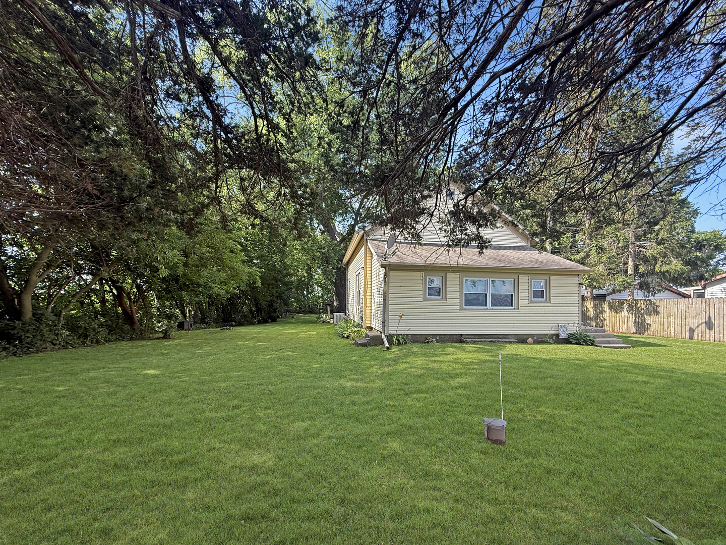 5843 West Stephenson St Road Freeport, IL 61032 - Photo 29 of 30 a view of a house with a backyard