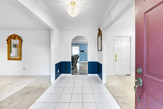 a kitchen with stainless steel appliances a refrigerator and a stove