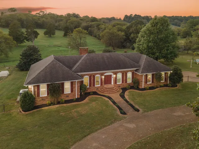 a view of house with outdoor space