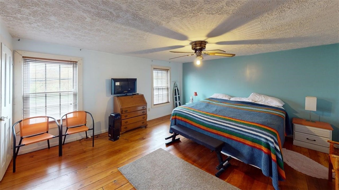 7667 State Highway Springfield Center, NY 13468 - Photo 45 of 50 Owner/Manager's Apartment - large bedroom with Kin