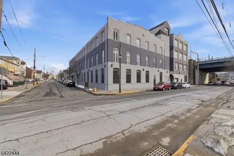 a view of a building and a street