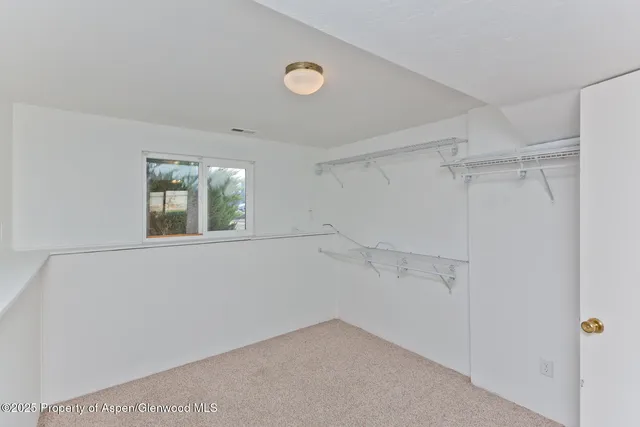 a view of a yard with a house and a garden