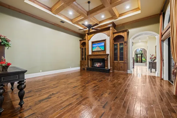 a view of a livingroom with furniture and a window