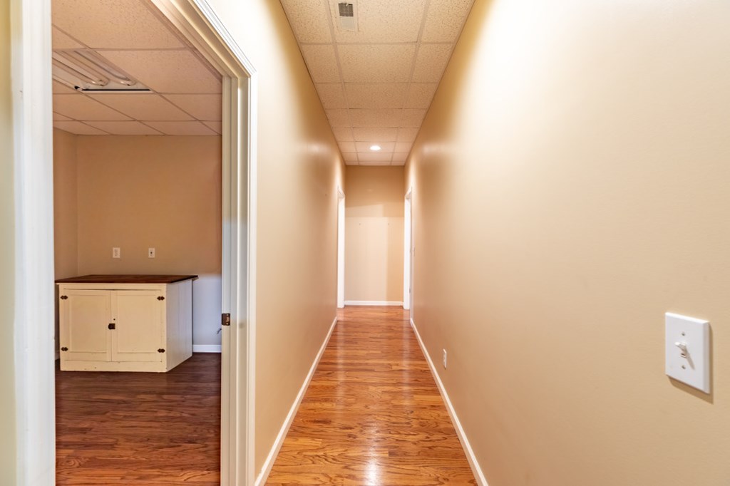 7 Spring Road Blairsville, GA 30512 - Photo 25 of 56 a view of a hallway with wooden floor