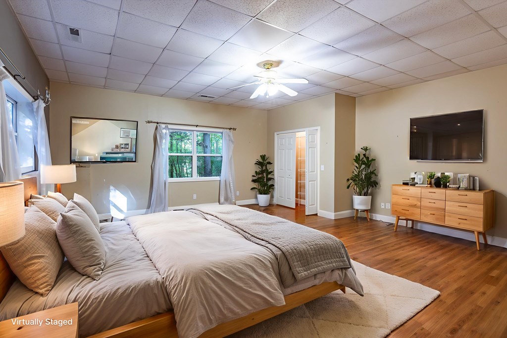 7 Spring Road Blairsville, GA 30512 - Photo 28 of 56 a bedroom with a large bed and a flat screen tv