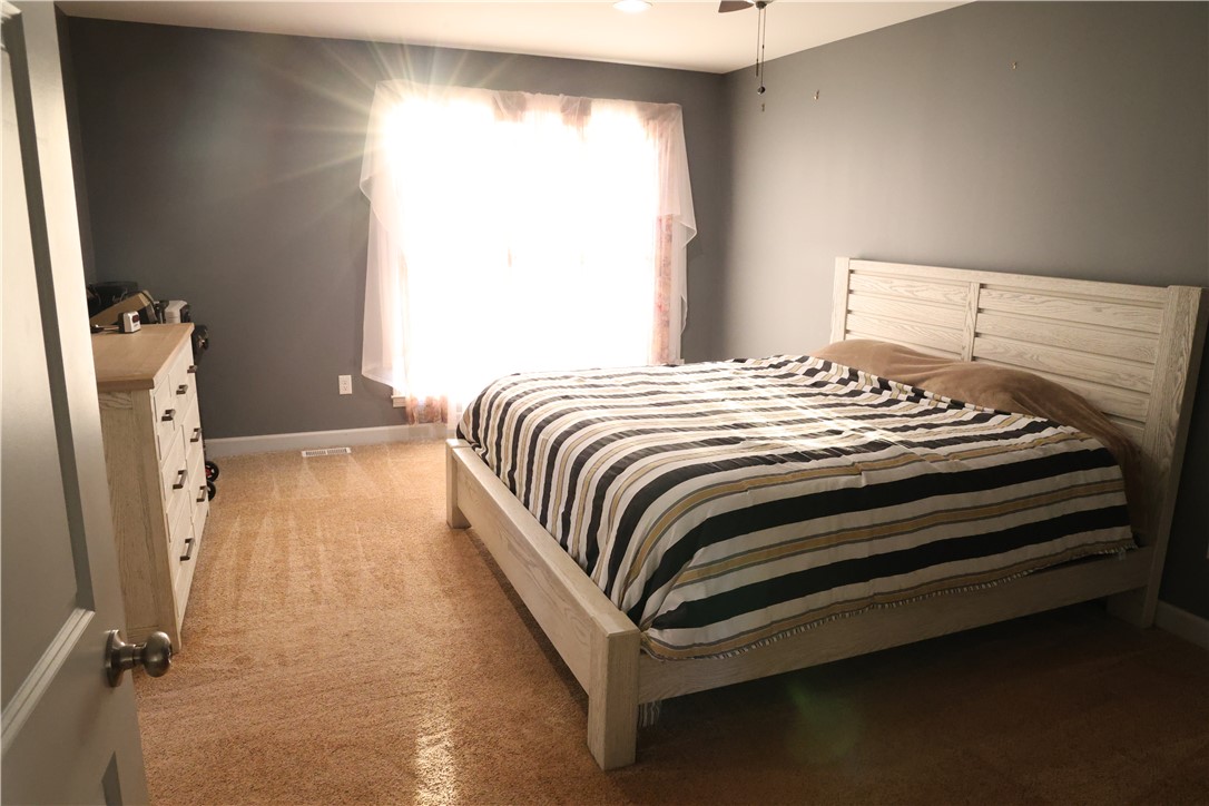 5381 Olden Porter Road Pendleton, SC 29670 - Photo 21 of 31 This spacious bedroom offers comfortable living with soft carpeting and natural light.