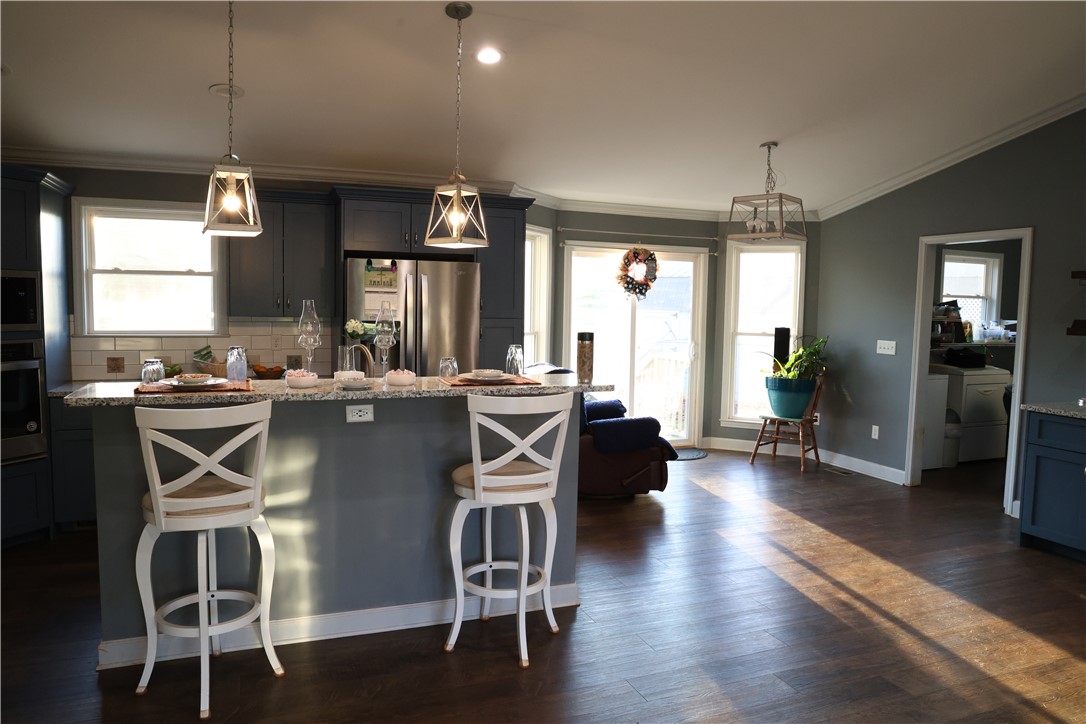 5381 Olden Porter Road Pendleton, SC 29670 - Photo 30 of 31 This spacious kitchen offers a seamless flow into the living area, perfect for gatherings.