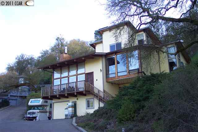 a house view with a outdoor space