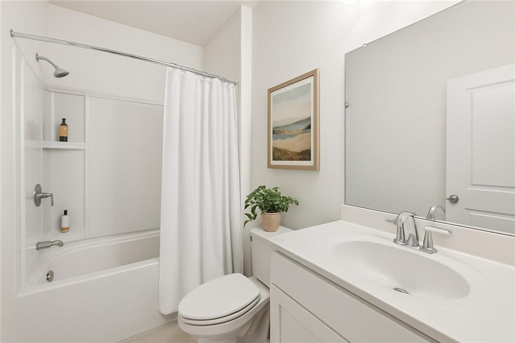 1155 Millennium Park Road Decatur, GA 30033 - Photo 48 of 81 a bathroom with a sink toilet and shower