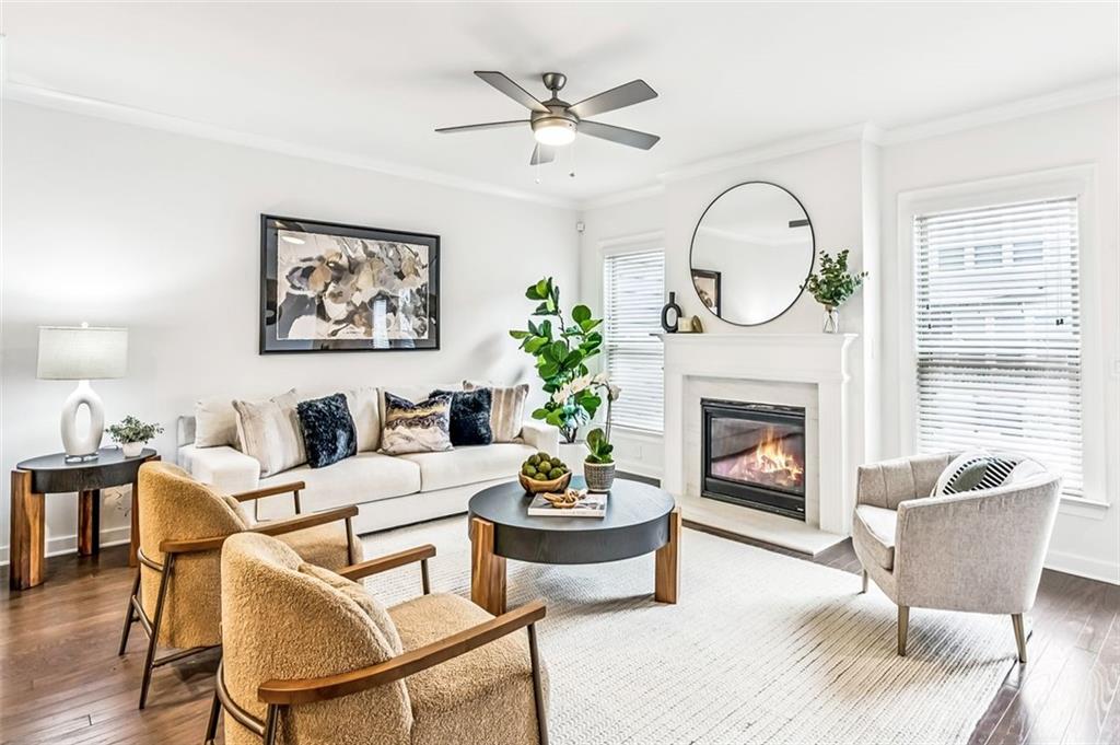 1155 Millennium Park Road Decatur, GA 30033 - Photo 5 of 81 a living room with furniture a fireplace and a potted plant