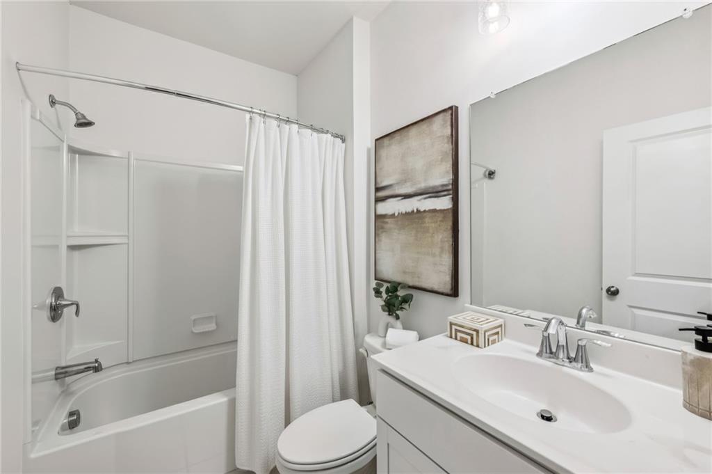 1155 Millennium Park Road Decatur, GA 30033 - Photo 53 of 81 a bathroom with a sink toilet and shower