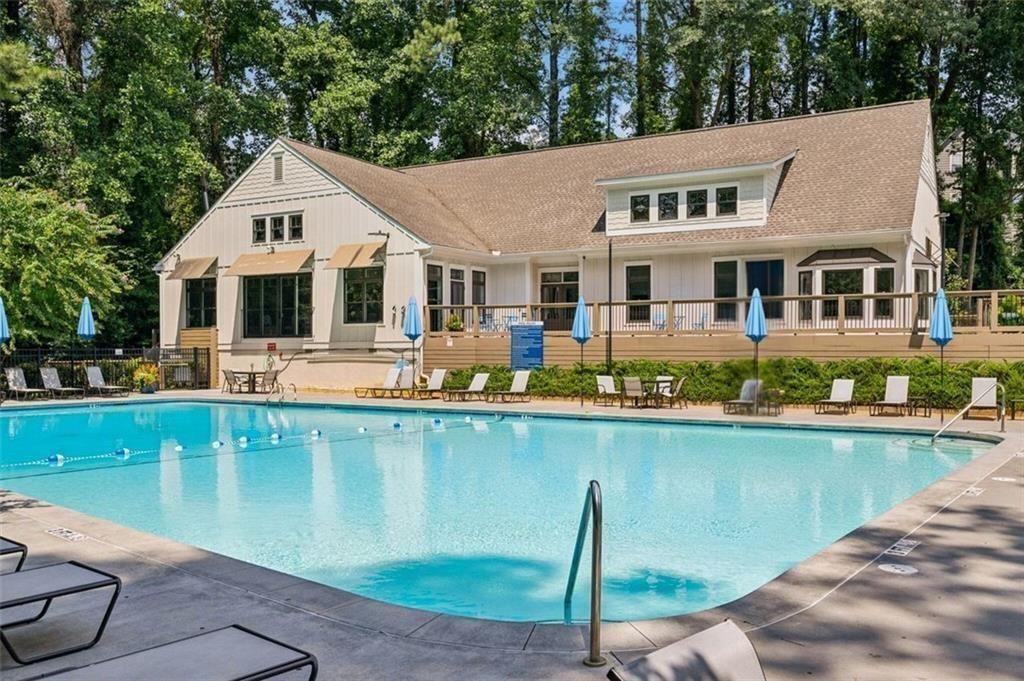 1155 Millennium Park Road Decatur, GA 30033 - Photo 10 of 81 a front view of a house with swimming pool having outdoor seating