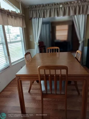 a view of swimming pool from a balcony