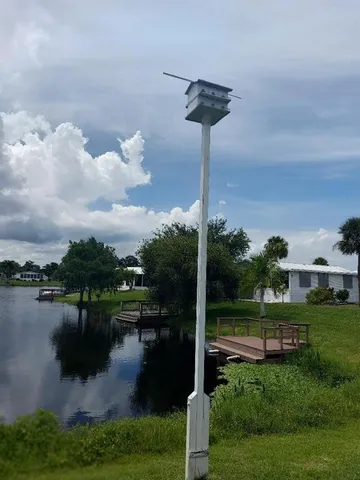 a lake view with a garden