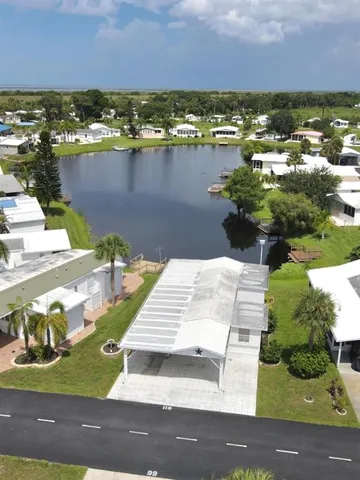 an aerial view of a houses with outdoor space