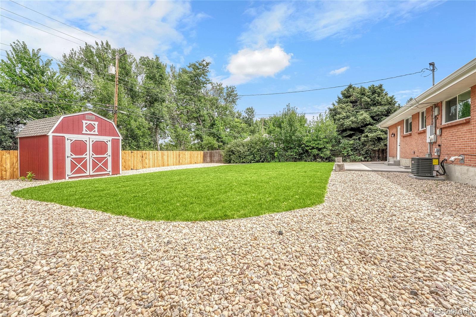 215 East Panama Drive Centennial, CO 80121 - Photo 43 of 50 a view of a back yard of the house
