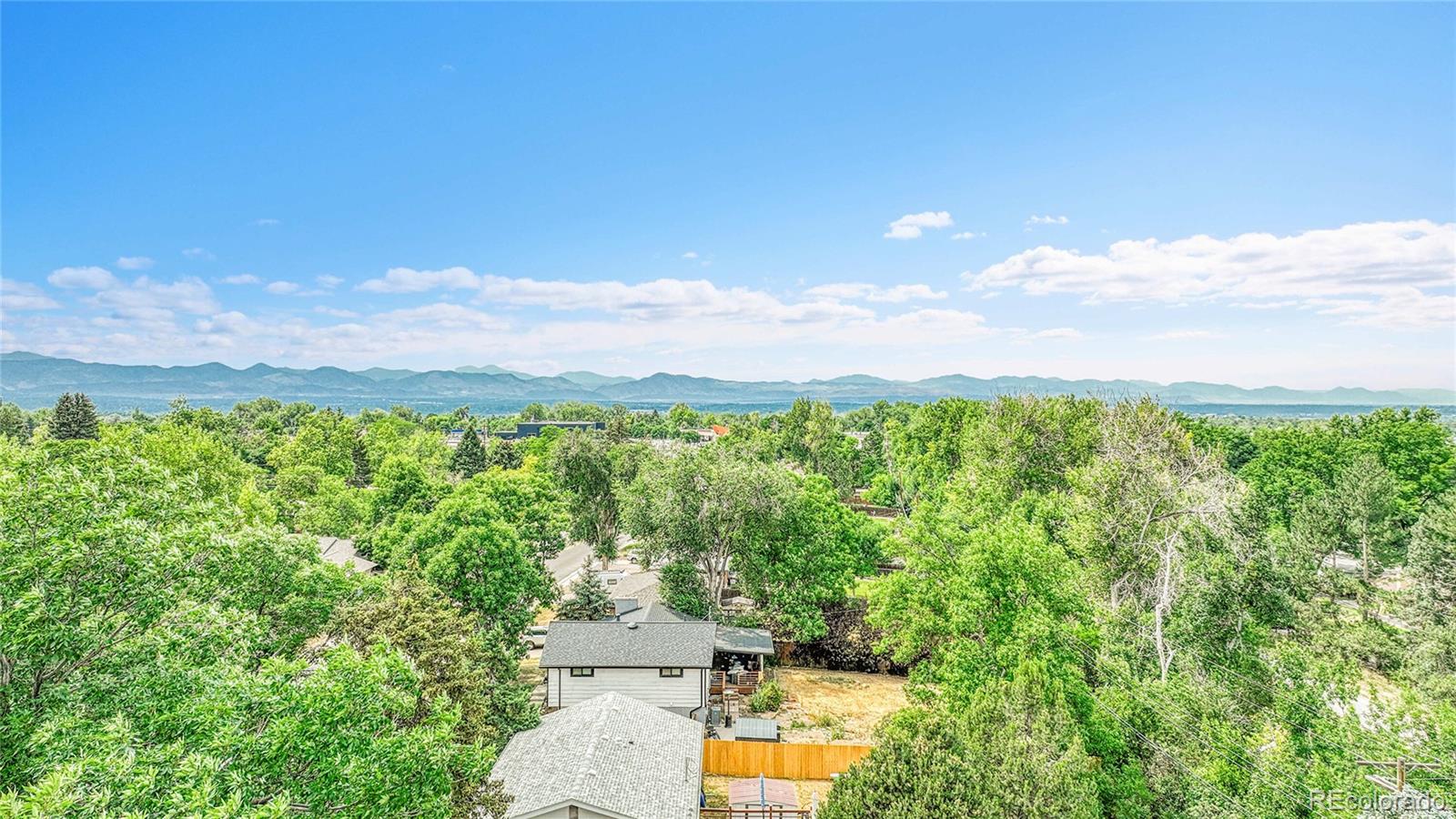 215 East Panama Drive Centennial, CO 80121 - Photo 50 of 50 a view of a garden with an outdoor seating