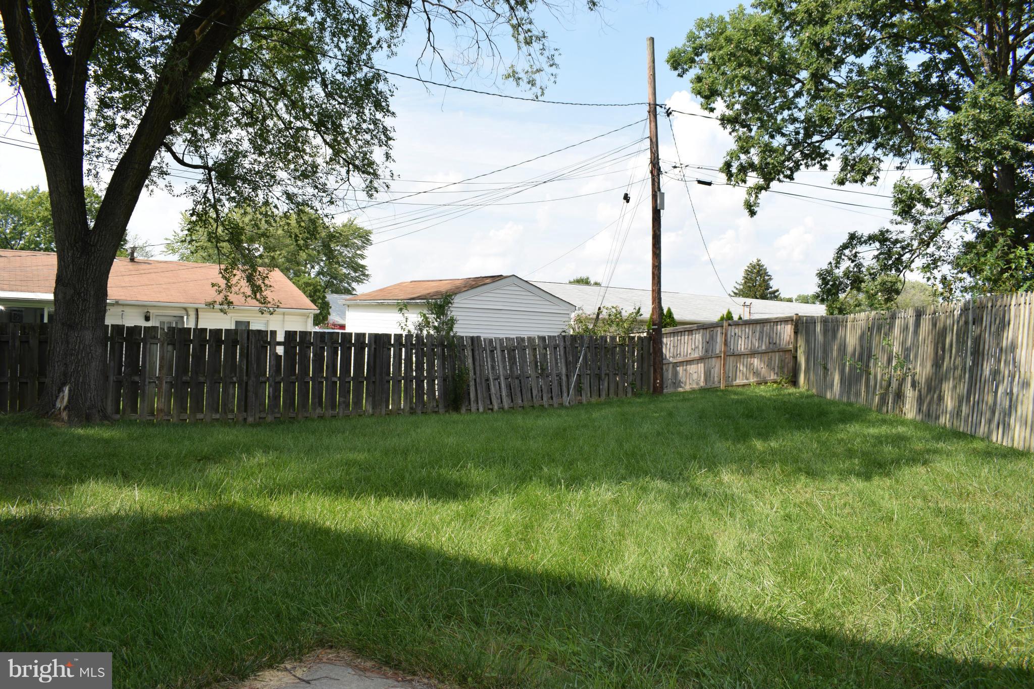 1902 Brookdale Road Windsor Mill, MD 21244 - Photo 11 of 13 a view of a backyard with wooden fence