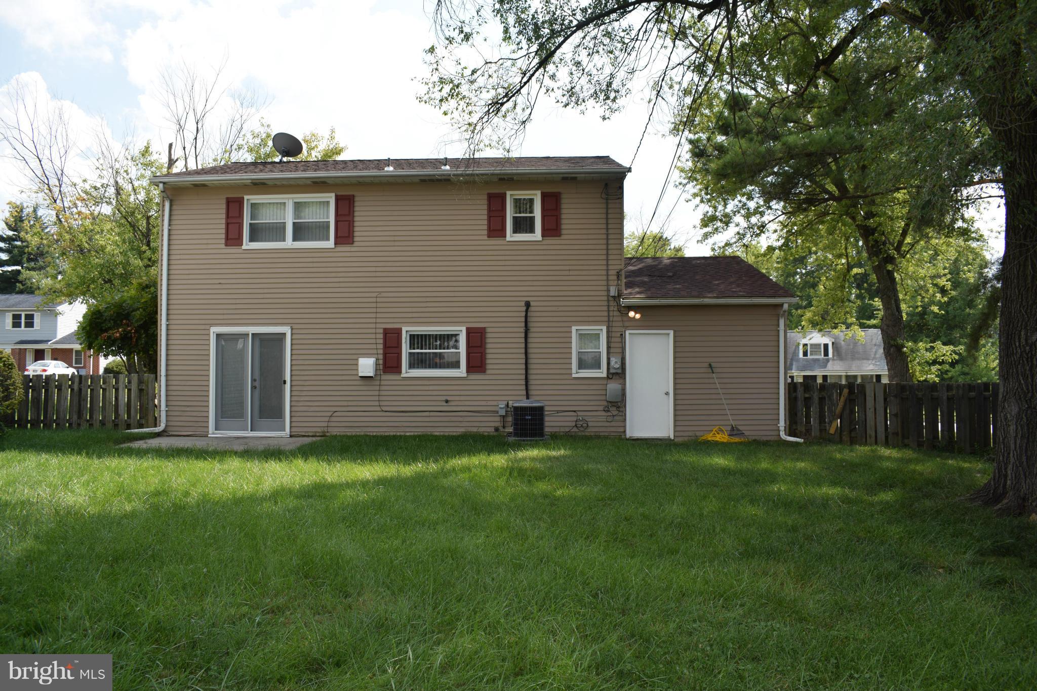 1902 Brookdale Road Windsor Mill, MD 21244 - Photo 3 of 13 a view of a house with a yard