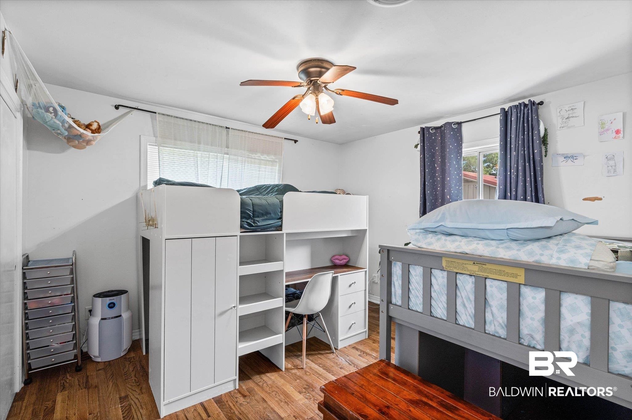 4213 Shan Drive East Mobile, AL 36693 - Photo 18 of 35 Interior room featuring wood-finish flooring, a ceiling fan with light fixture, and white walls