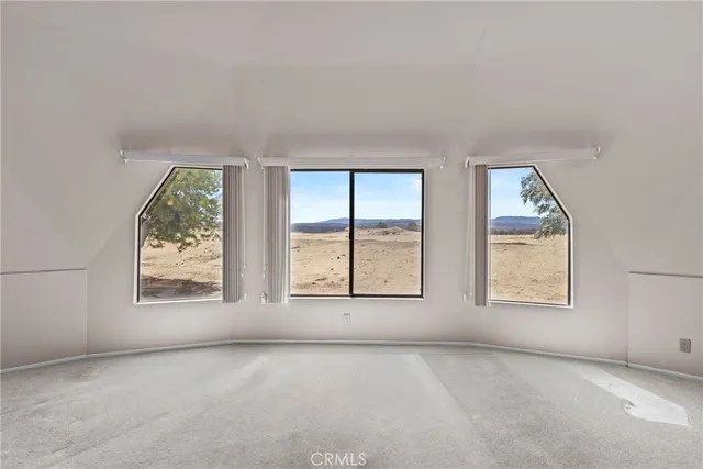 a kitchen with a sink a stove a refrigerator and cabinets