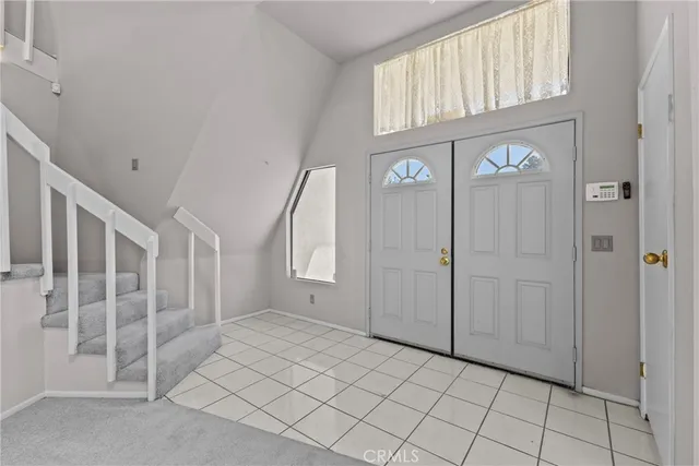 a view of livingroom with furniture and entryway