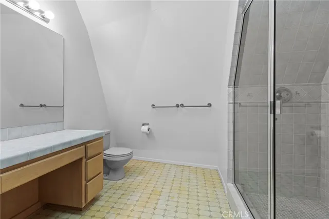 a view of a dry yard with a house