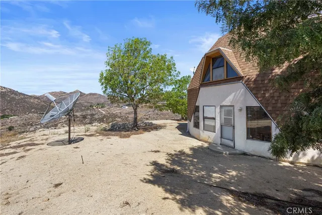 an aerial view of a house having yard