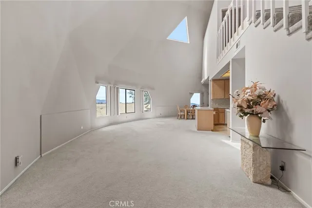 a view of livingroom with furniture and entryway