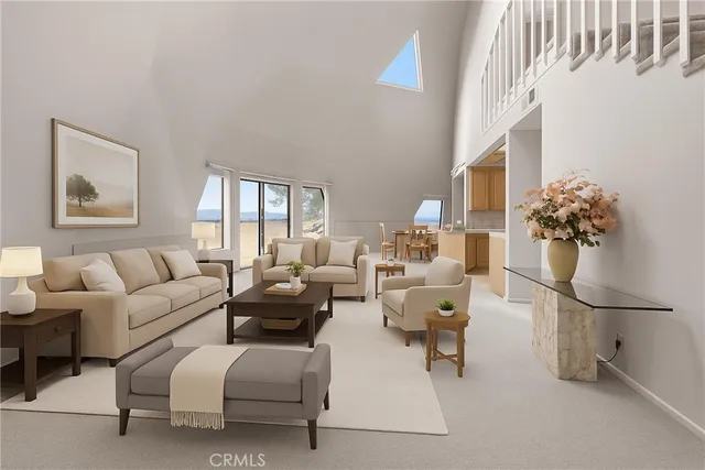 a view of empty room with large windows