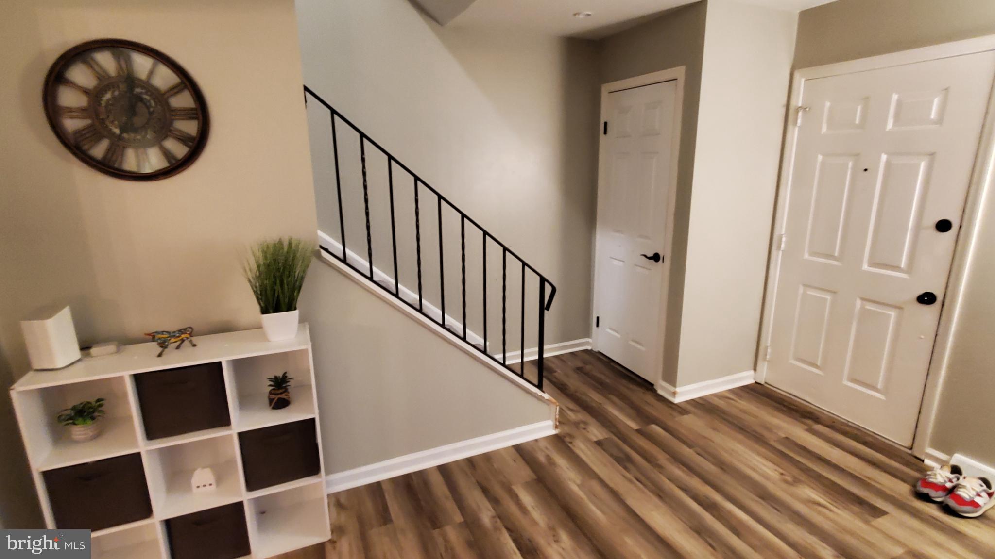 916 Timber Lane Reading, PA 19608 - Photo 2 of 29 a view of a hallway with wooden floor and entryway