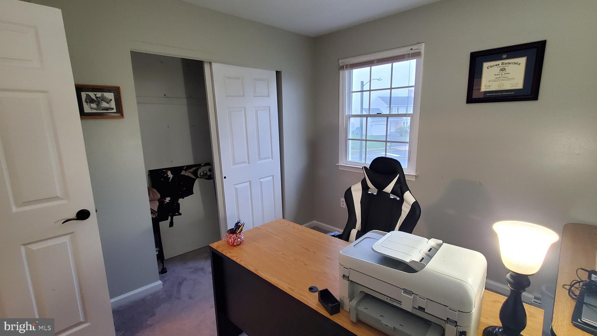 916 Timber Lane Reading, PA 19608 - Photo 21 of 29 a view of a workspace with furniture and a window