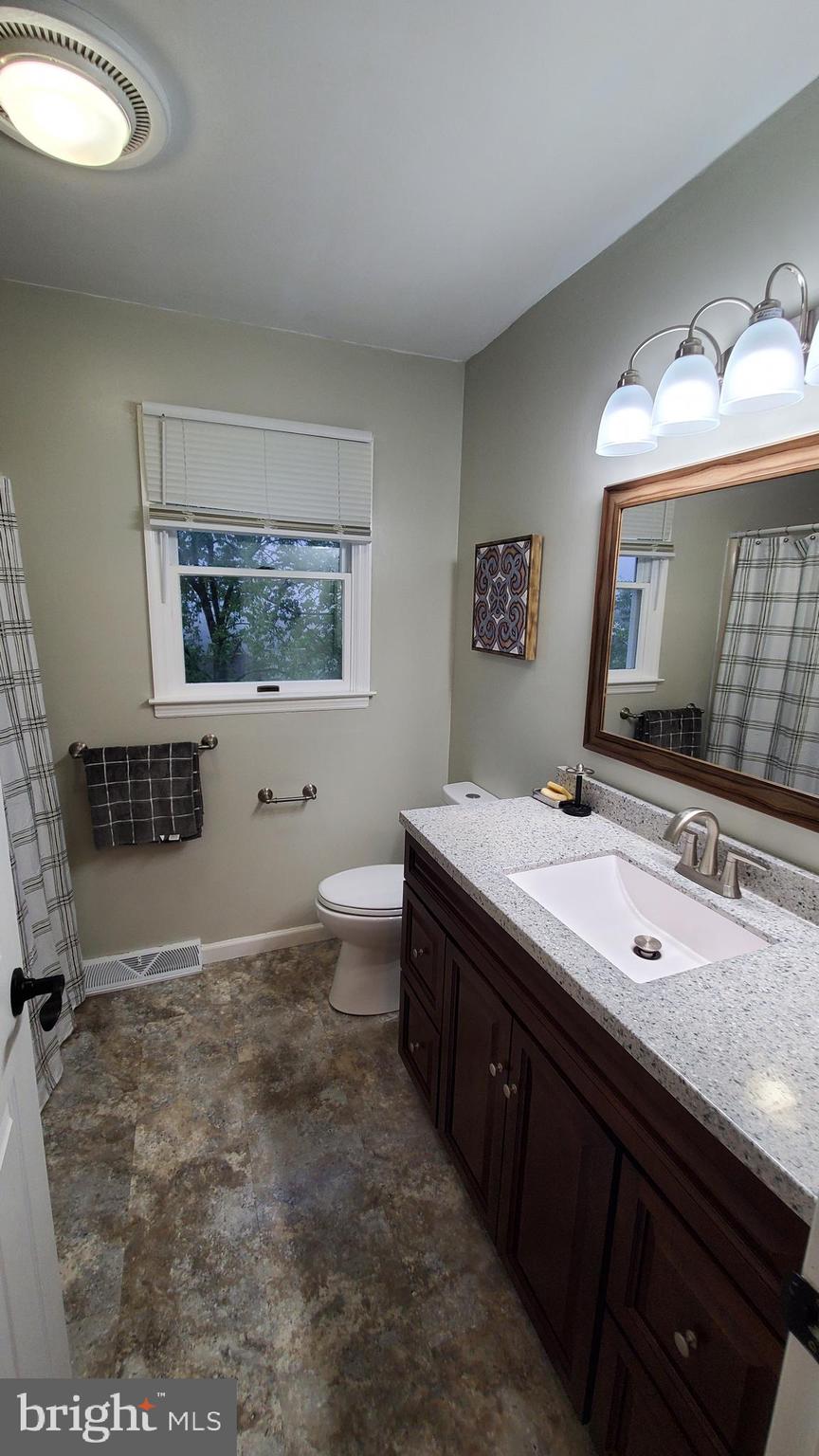 916 Timber Lane Reading, PA 19608 - Photo 23 of 29 a bathroom with a sink double vanity and a mirror
