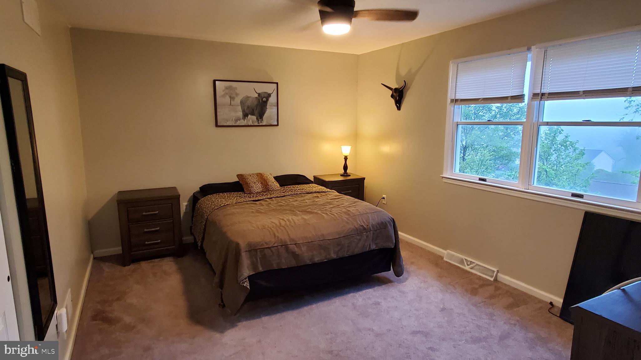 916 Timber Lane Reading, PA 19608 - Photo 29 of 29 a bedroom with a bed and a window