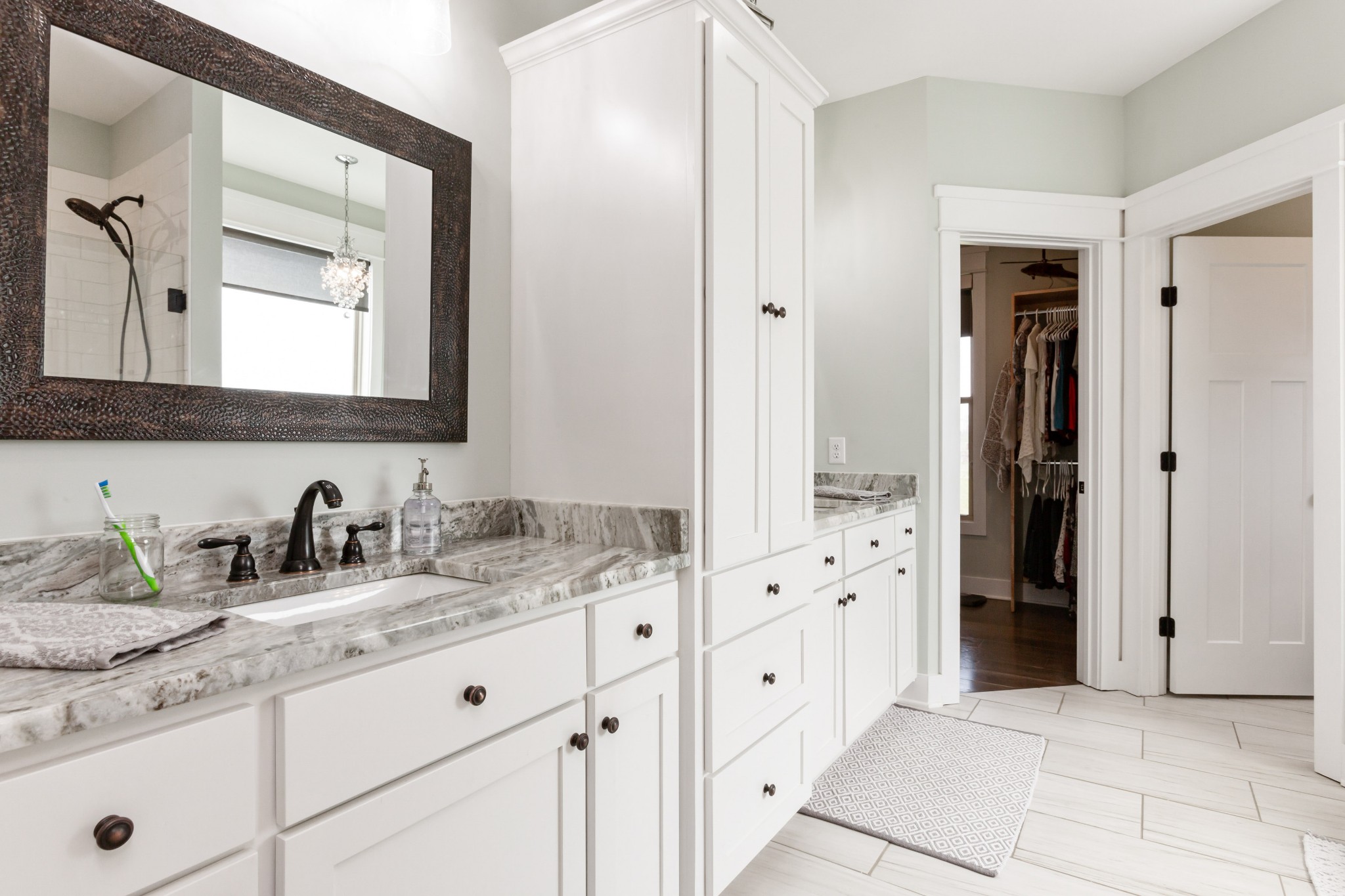 459 Halltown Road Portland, TN 37148 - Photo 23 of 42 a bathroom with a granite countertop sink and a mirror
