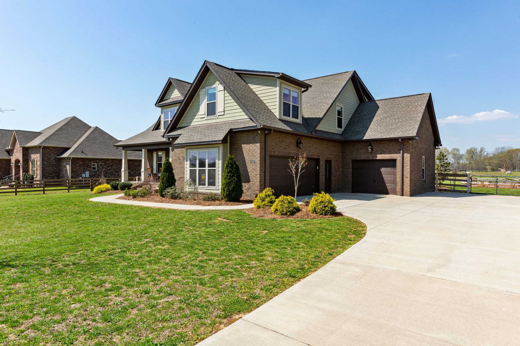 459 Halltown Road Portland, TN 37148 - Photo 4 of 42 a front view of a house with garden