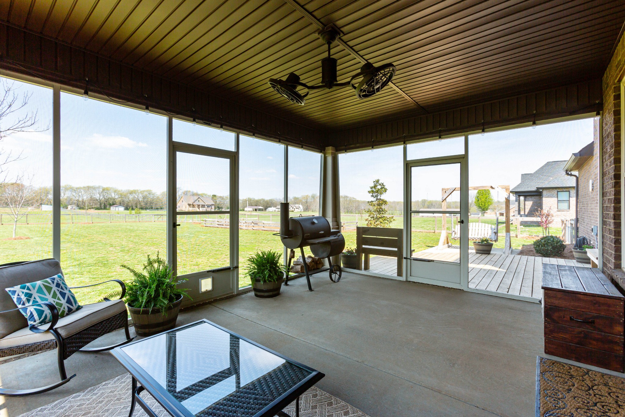 459 Halltown Road Portland, TN 37148 - Photo 36 of 42 a living room with furniture and floor to ceiling windows