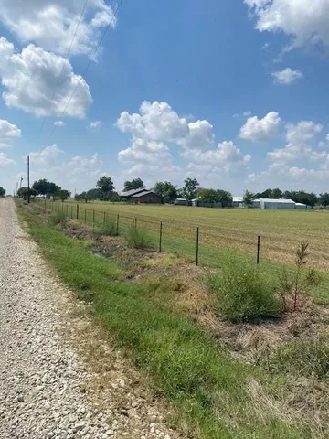 a view of a garden with an outdoor space