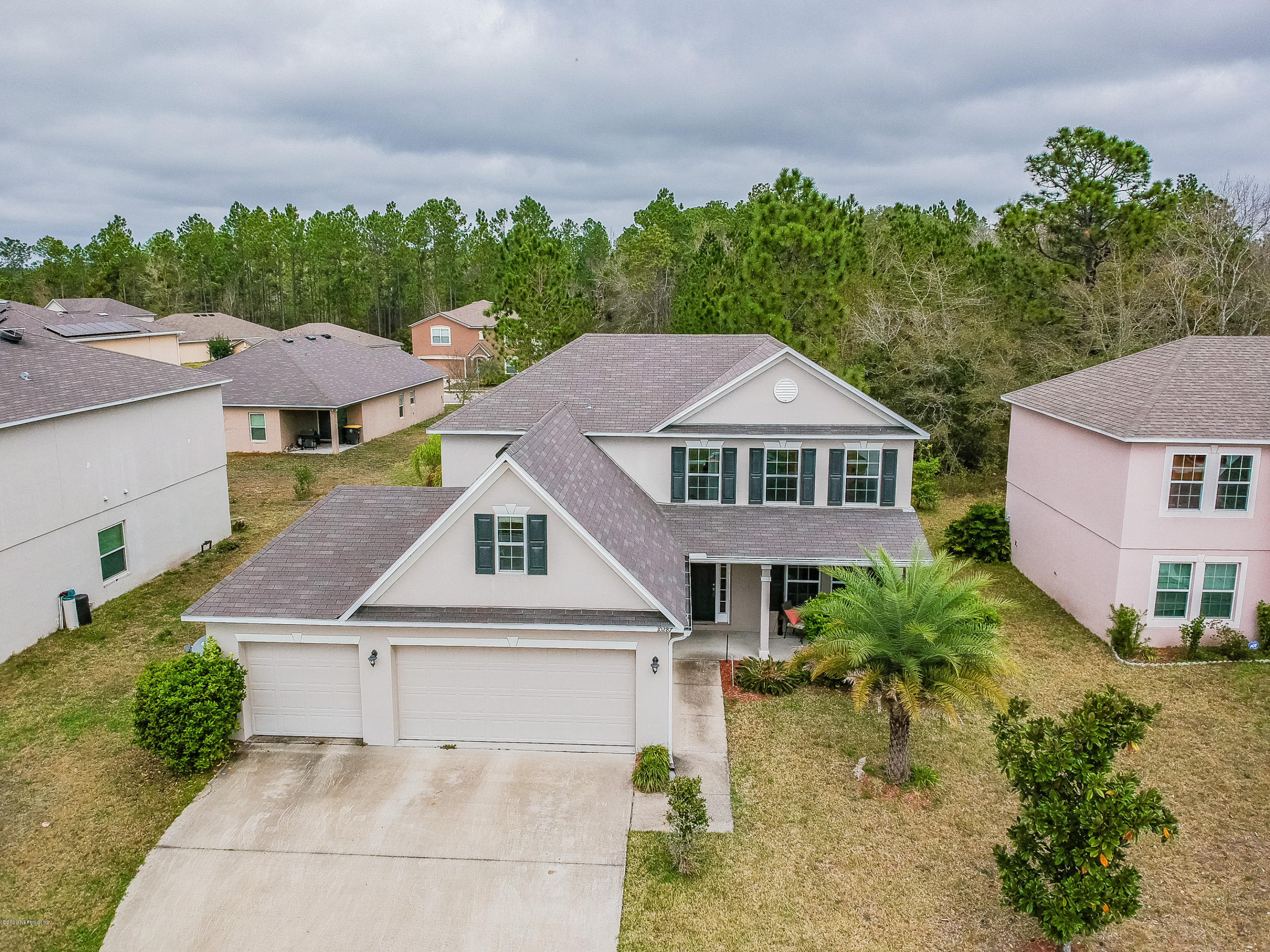 10287 Magnolia Ridge Road Jacksonville, FL 32210 - Photo 3 of 44 Elevated Front View